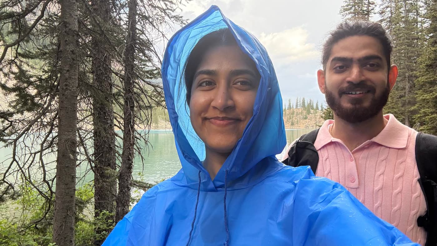 Abirami and Prateek hiking in the rain